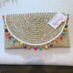Pink Lily Boutique straw clutch